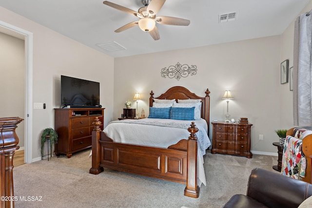 bedroom featuring light carpet and ceiling fan