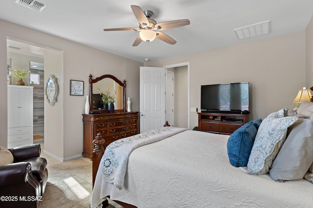 bedroom with ceiling fan and light carpet