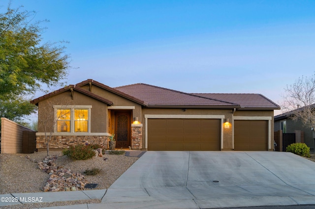 view of front of property featuring a garage