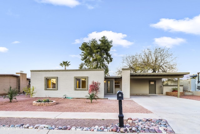 view of front of house with a carport