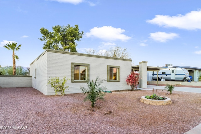 view of front of house featuring a carport