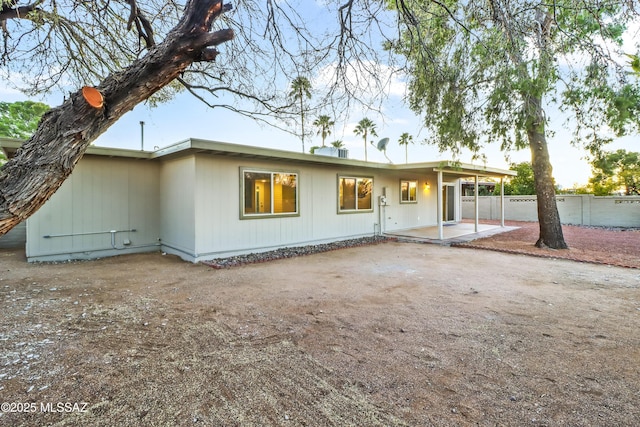 rear view of property with a patio