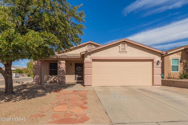 ranch-style home with a garage