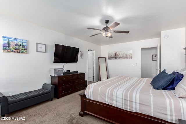 bedroom featuring light colored carpet and ceiling fan