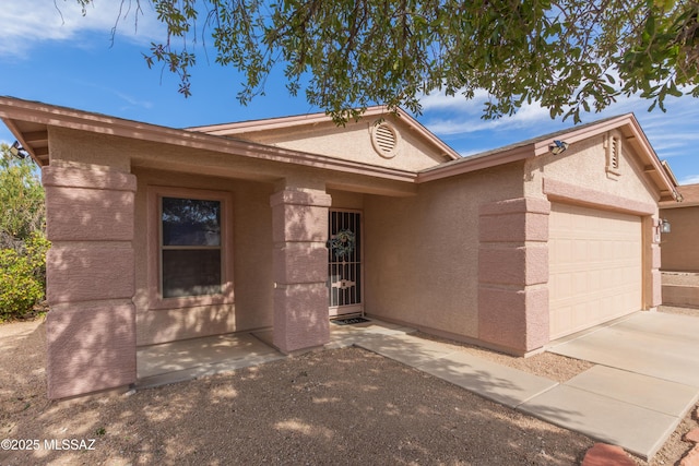 ranch-style home with a garage