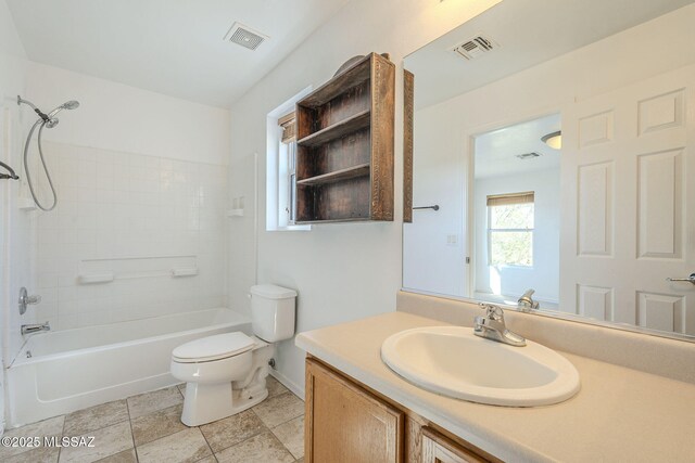 full bathroom with visible vents, shower / washtub combination, vanity, and toilet