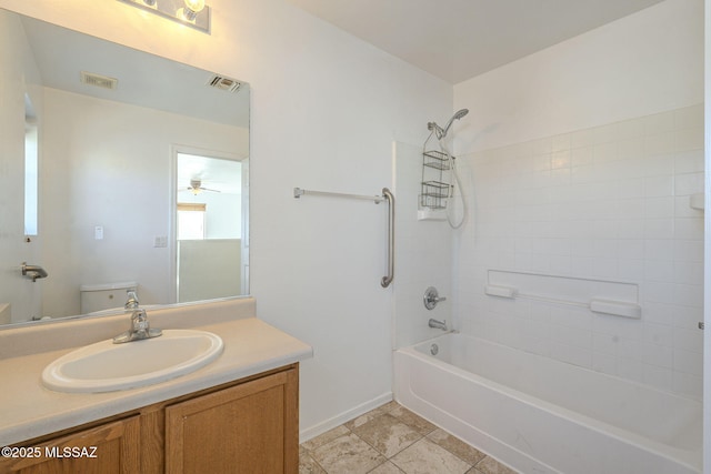 bathroom featuring shower / washtub combination, visible vents, vanity, and toilet