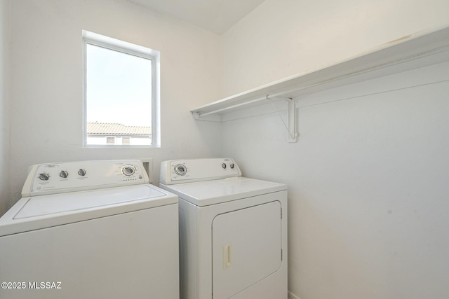 washroom with laundry area and independent washer and dryer