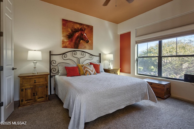 bedroom featuring ceiling fan and carpet flooring