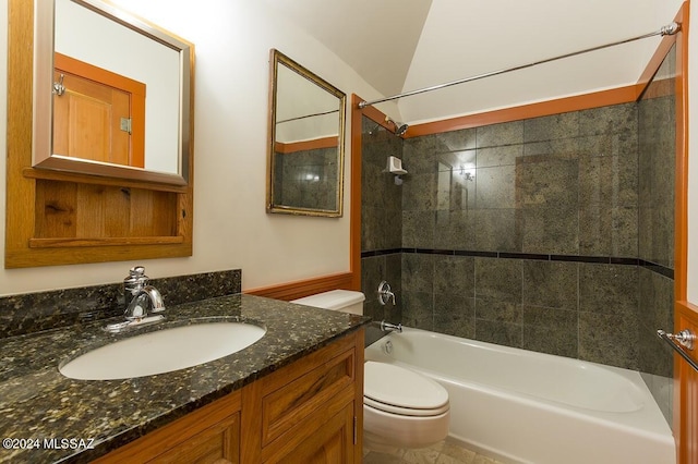 full bathroom with vanity, toilet, and tiled shower / bath