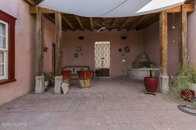 view of patio / terrace with ceiling fan