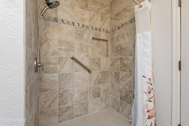 bathroom featuring walk in shower