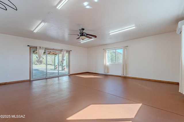 spare room with ceiling fan