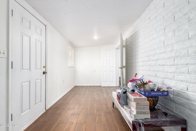 hallway featuring wood-type flooring