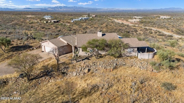 drone / aerial view with a mountain view