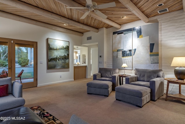 living room featuring beamed ceiling, carpet, wooden ceiling, and ceiling fan