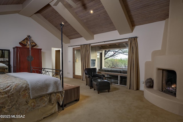 carpeted bedroom featuring high vaulted ceiling, wooden ceiling, a large fireplace, and beamed ceiling