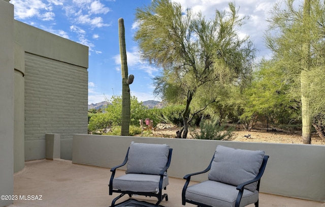 view of patio featuring a mountain view