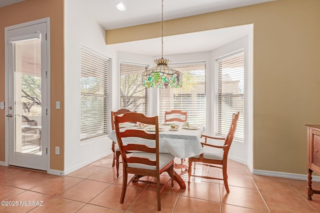 view of tiled dining space