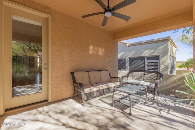 view of patio / terrace featuring ceiling fan and outdoor lounge area