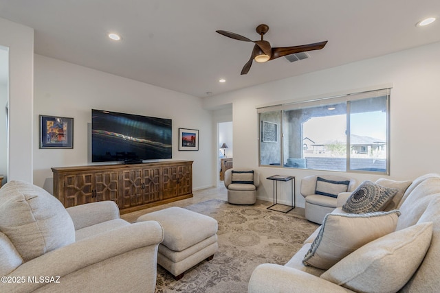 living room featuring ceiling fan