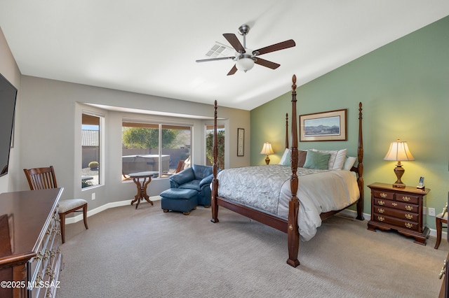 bedroom with ceiling fan, vaulted ceiling, and light carpet