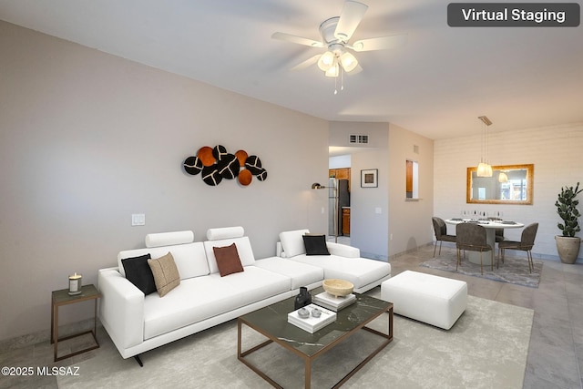 living room featuring ceiling fan