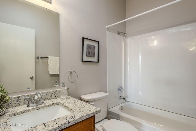 full bathroom with toilet, vanity, and bathtub / shower combination