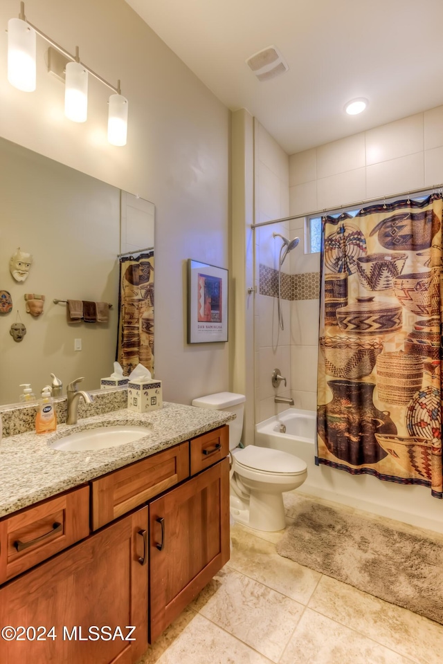 full bathroom featuring vanity, toilet, and shower / bath combo