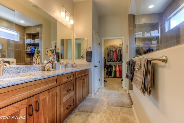 bathroom featuring plenty of natural light and vanity