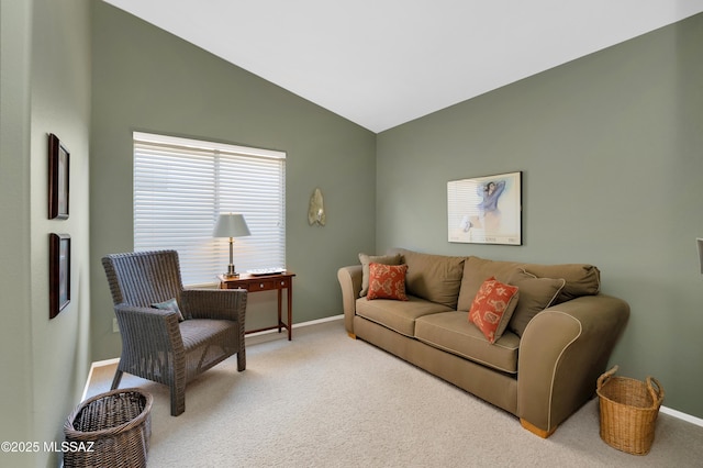 carpeted living room with vaulted ceiling