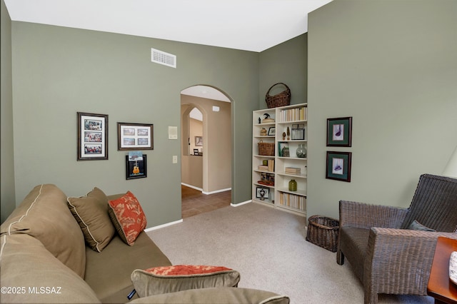 living room featuring light carpet