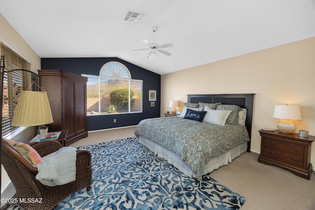 carpeted bedroom featuring vaulted ceiling and ceiling fan