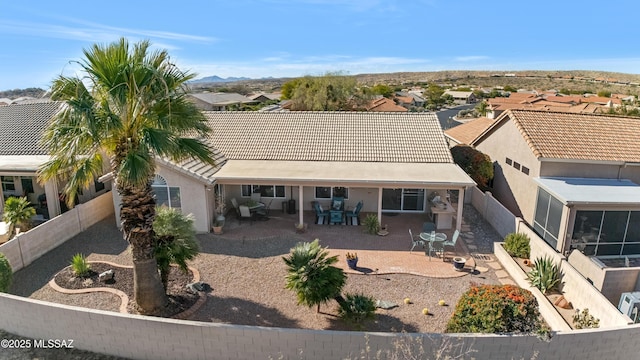 view of front of property featuring a patio