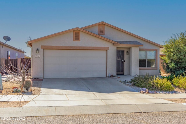 ranch-style house featuring a garage