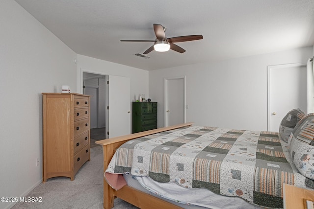 carpeted bedroom with ceiling fan