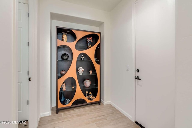 wine cellar with wood finish floors