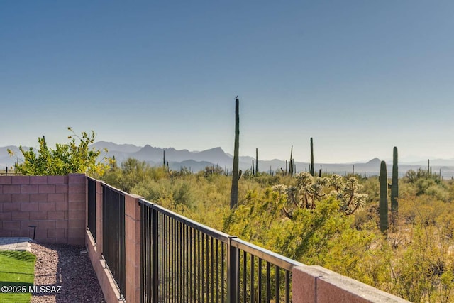 balcony featuring a mountain view