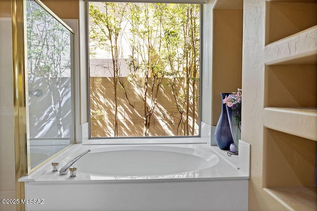 bathroom with a washtub