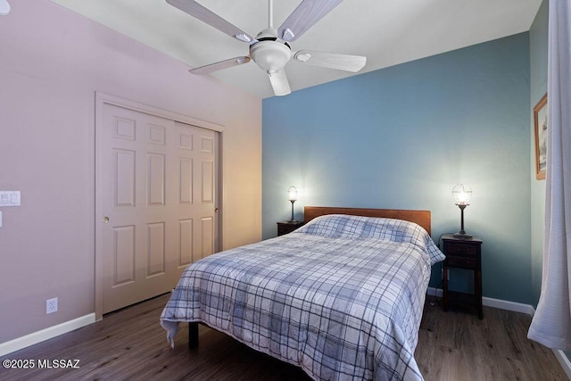 bedroom featuring a closet, ceiling fan, and dark hardwood / wood-style floors