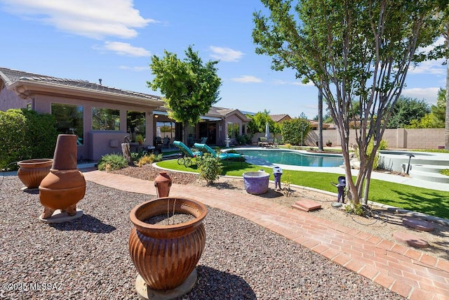 view of pool featuring a patio