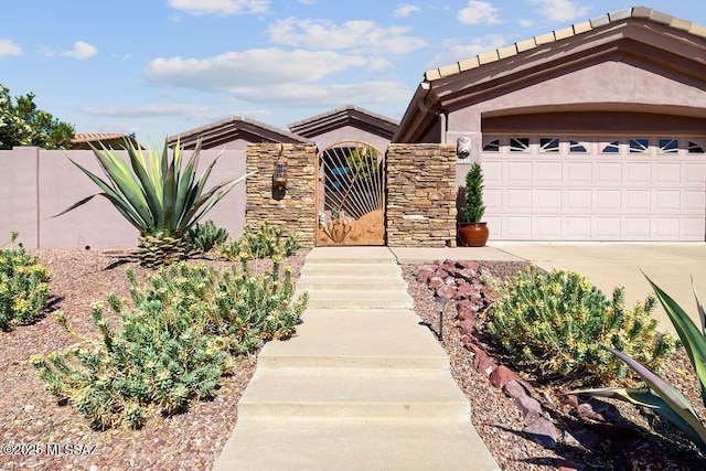 view of front of home with a garage