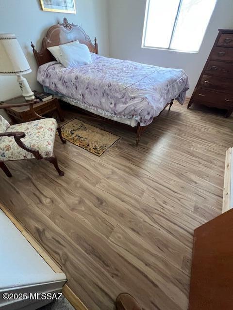 bedroom featuring light wood-type flooring