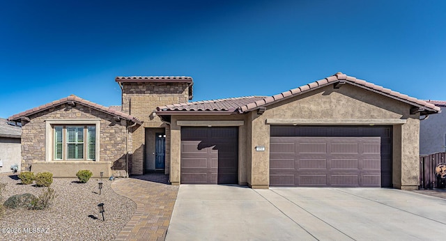 view of front of property featuring a garage