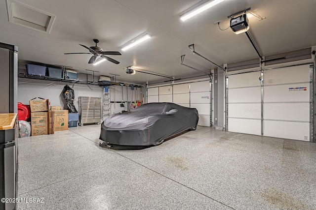 garage featuring a garage door opener and ceiling fan