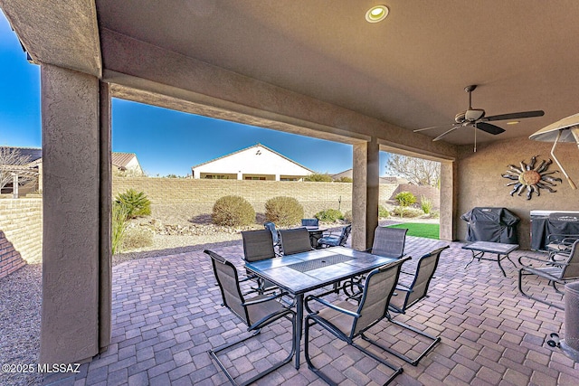 view of patio featuring ceiling fan and area for grilling