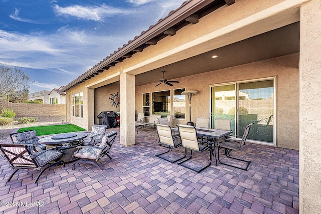 view of patio with ceiling fan