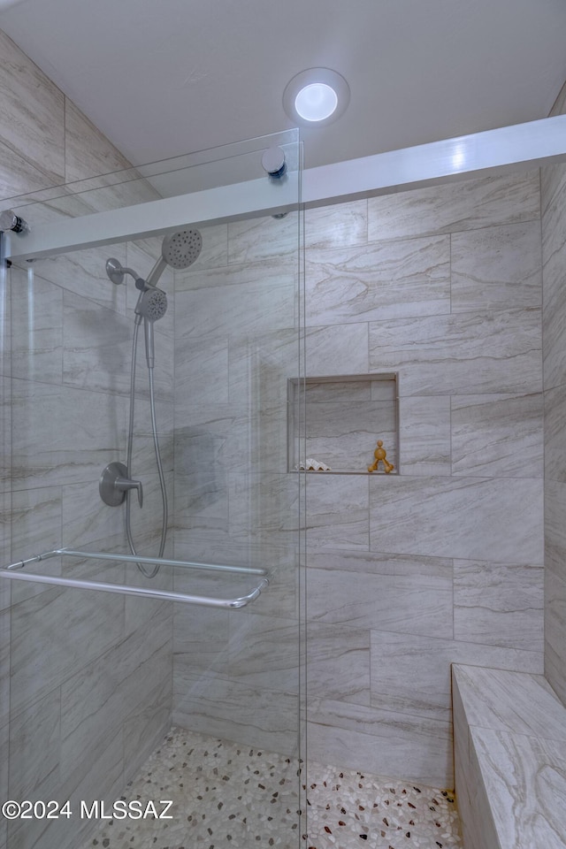 bathroom featuring a shower stall