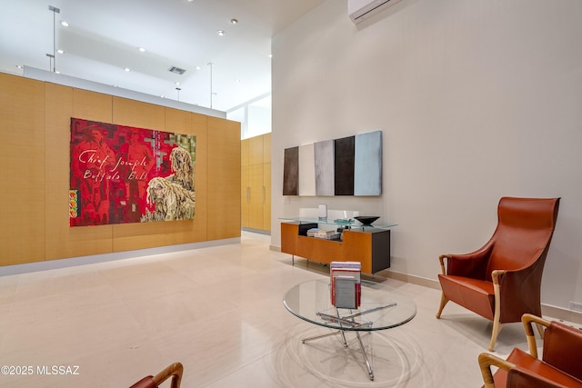 interior space with tile patterned flooring and a high ceiling