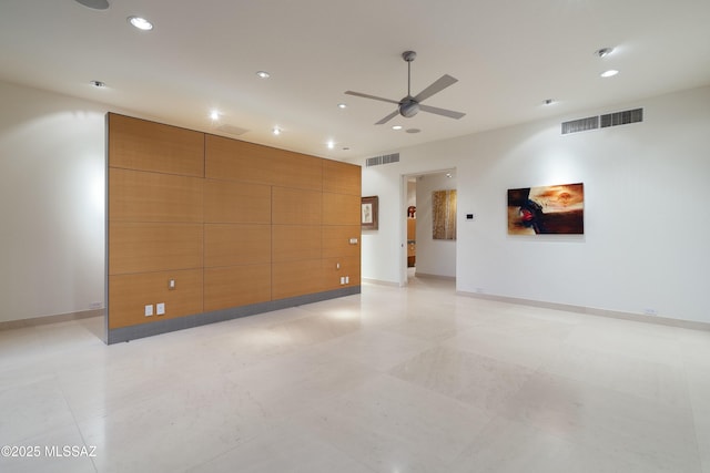 unfurnished room with ceiling fan